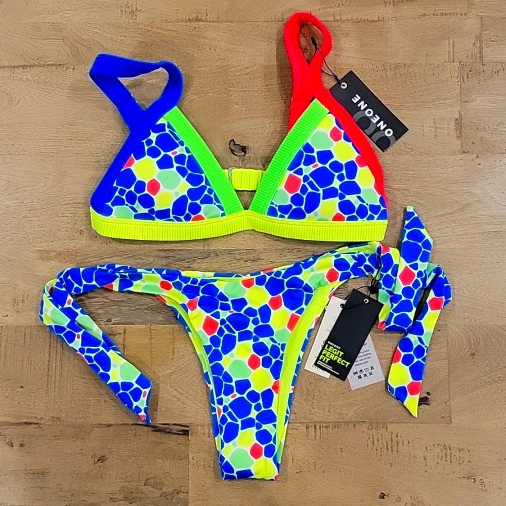 One one swim. Multi colour, top and bottom size large